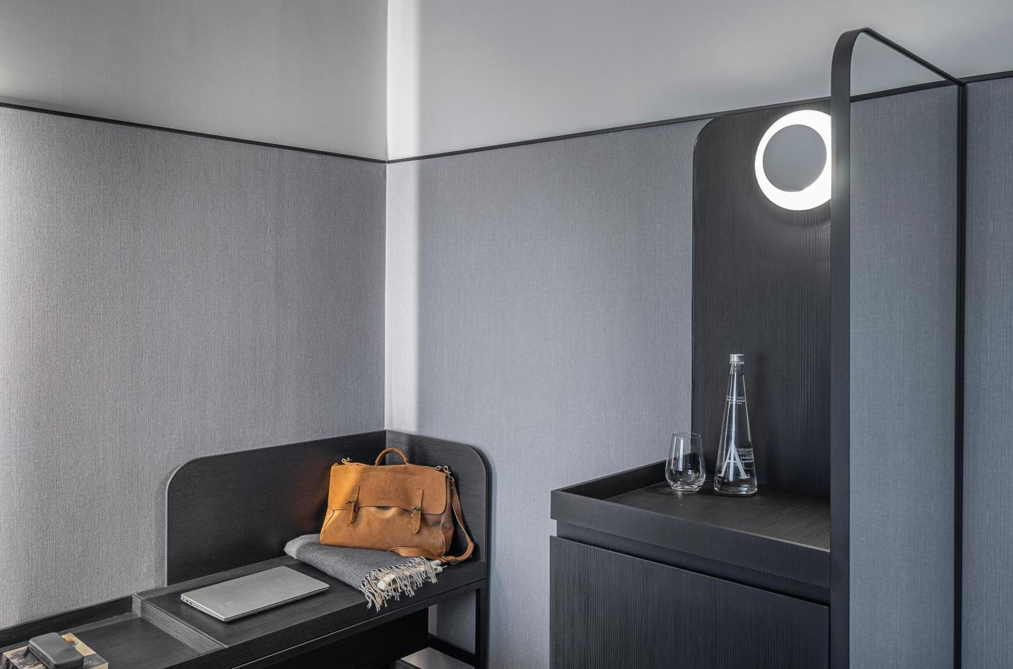 Pullman Santiago Vitacura Экстерьер фото A room at the hotel