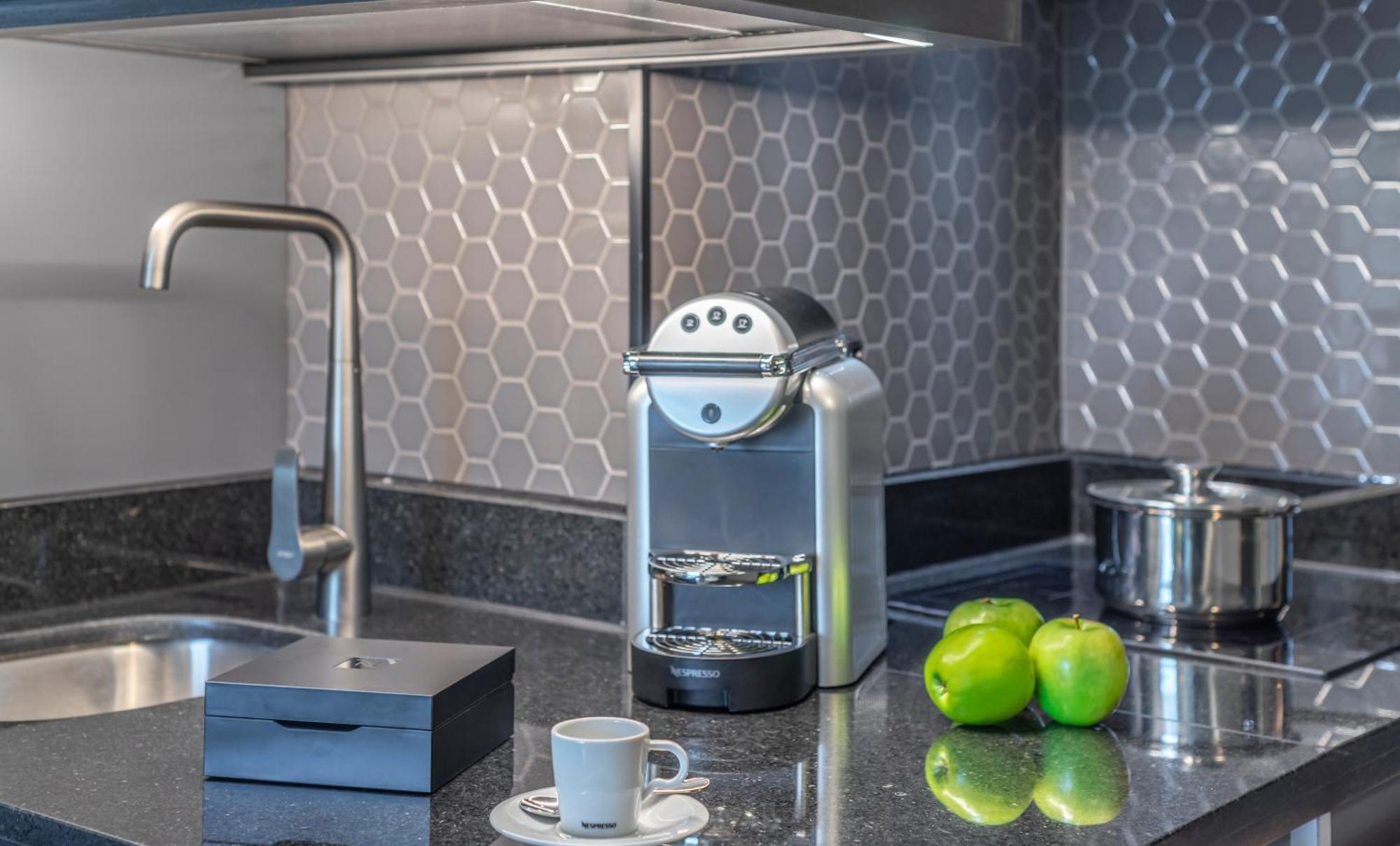 Pullman Santiago Vitacura Экстерьер фото A Nespresso coffee machine